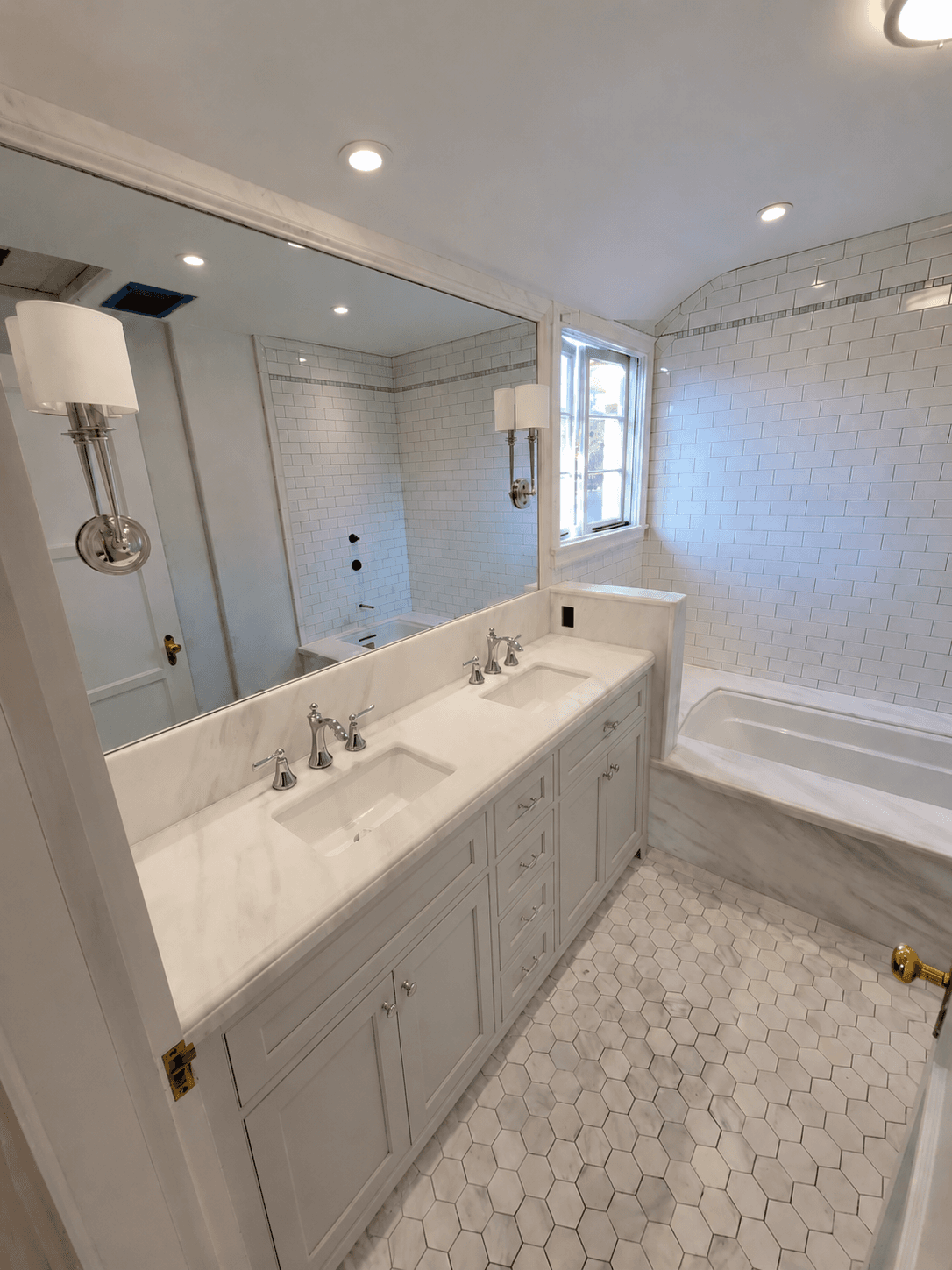 Finished marble double-vanity bathroom remodel in a San Marino home